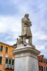Fototapeta na wymiar Monument to Italian linguist Niccolo Tommaseo in Venice, Italy