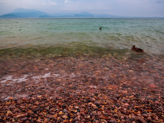 Lake Gardasee Water view during Summer vacation time with a mediterranean feeling