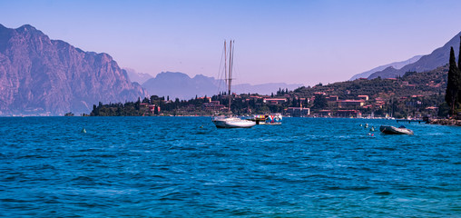 Lake Gardasee Water view during Summer vacation time with a mediterranean feeling