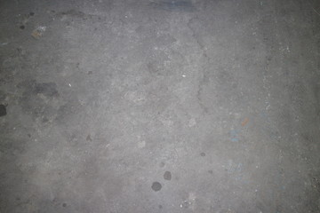 concrete industrial floor with oil stains