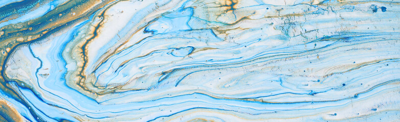 photography of abstract marbleized effect background. Blue, mint, gold and white creative colors. Beautiful paint. banner