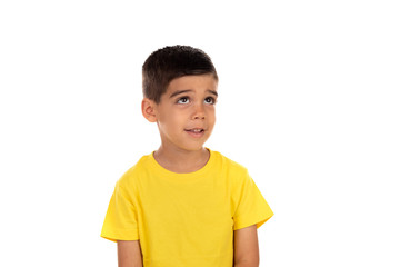 Pensive child with yellow t-shirt