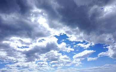 Cumulonimbus before rain and clearly blue sky above it