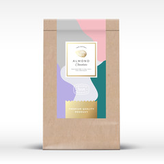 Craft Paper Bag with Almond Chocolate Label. Abstract Vector Packaging Design Layout with Realistic Shadows. Modern Typography, Hand Drawn Nut Silhouette and Colorful Background.