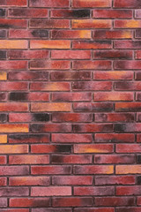 Fototapeta premium brick wall with red, orange bricks. textured background