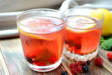 Cold berry lemonade in glasses Summer refreshing drink