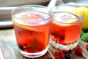 Cold berry lemonade in glasses Summer refreshing drink