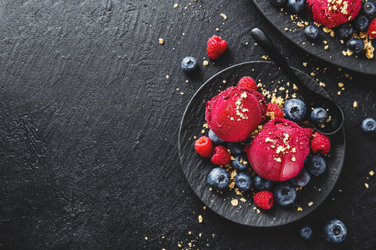 Berry refreshing ice cream scoops on plate
