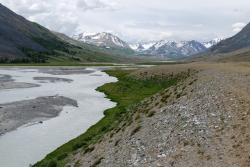 Western Mongolia mountainous landscape. View at Tsaagan Gol River ("White River"). Bayan-Ulgii Province, Mongolia.