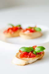 Bruschetta with tomato and basil.