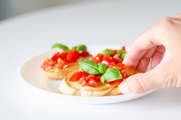 Bruschetta with tomato and basil.