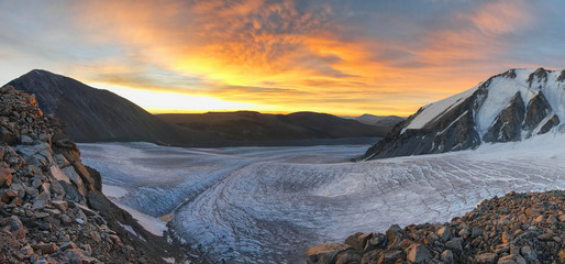 Fototapeta na wymiar Sunrise mountainous landscape. View at Potanin glacier and Malchin Peak. Altai Tavan Bogd National Park, Bayan-Ulgii Province, Mongolia.
