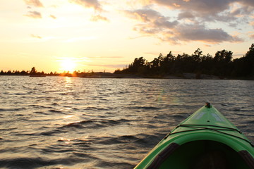 Paddling Canoe in the Sunset, kayaking in beautiful Georgan bay waters