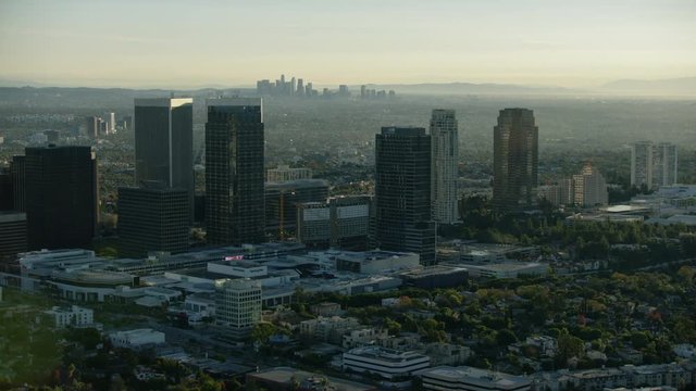Aerial sunrise view Century City and LA skyline