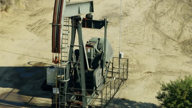 Aerial view pumpjack extracting fossil fuel Los Angeles