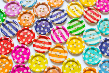 Various colorful sewing buttons, full frame