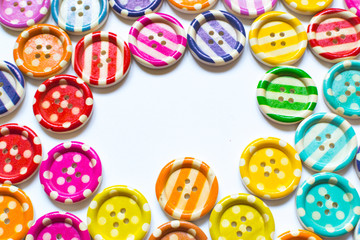 Various sewing buttons isolated on white background
