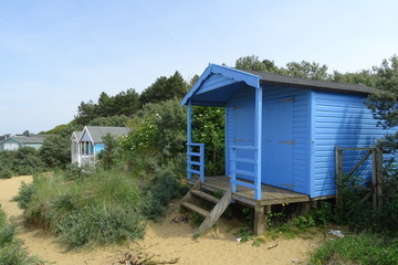 Colourful beach huts on the beach at Hunstanton, Norfolk, England, UK