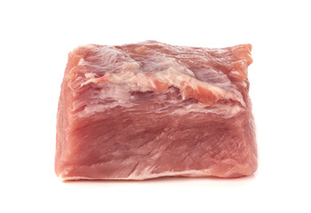 A piece of meat on a white background. Raw piece of pork close-up.