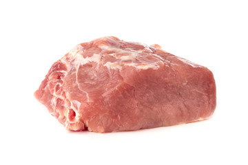 A piece of meat on a white background. Raw piece of pork close-up.