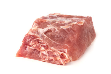 A piece of meat on a white background. Raw piece of pork close-up.