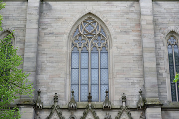 Beautiful, high and pointed window in the Evangelical Church in Germany. Exterior of the evangelical church