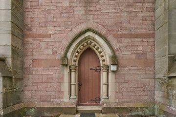 Fototapeta na wymiar Beautiful antique door, entrance to the Evangelical Church. Baden Baden, Germany