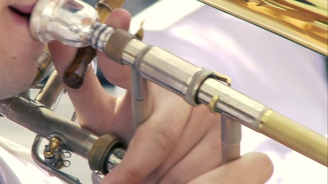 Playing the trumpet, close-up