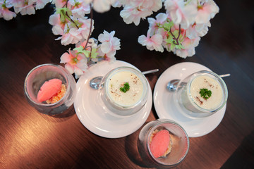 Tasty and delicious Lychee Sorbet and Spinach poached egg with sweet pastel peach and pink of...