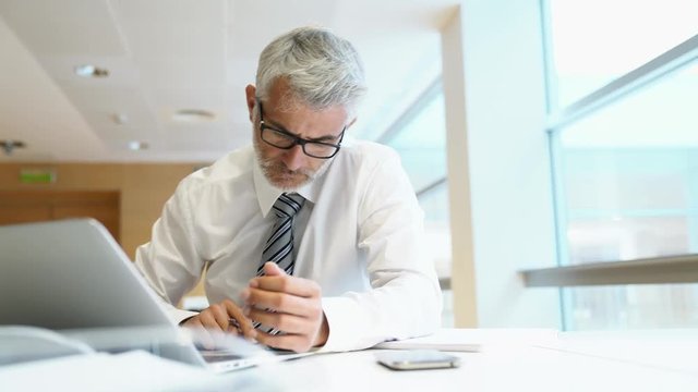 Businessman working in contemporary office