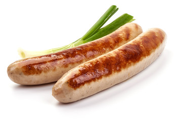 Grilled German white sausages, Thuringer Rostbratwurst, close-up, isolated on white background