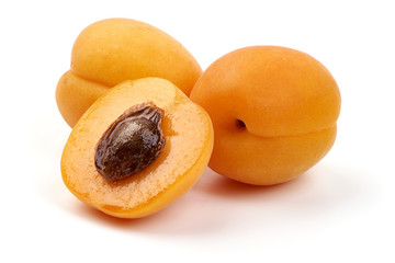 Naklejka na ściany i meble Sweet apricots with juicy half, ripe nectarines, close-up, isolated on white background