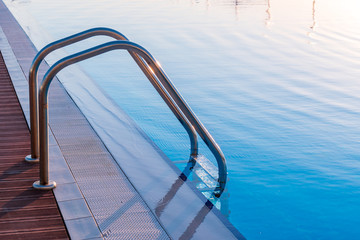 Fototapeta premium Swimming pool in curved shape with stairs