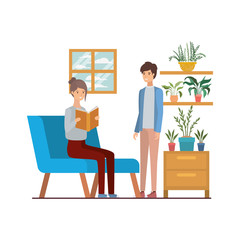 couple with book in hands in living room