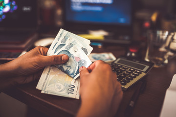 woman hands counting turkish lira