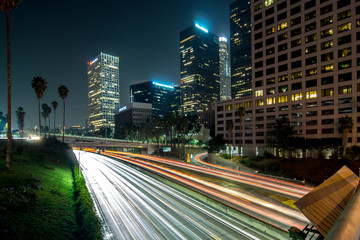 Fototapeta premium Los Angeles, Urban City at Sunset with Freeway Trafic