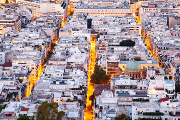 aerial view over Athens streets illuminated at night, Greece - obrazy, fototapety, plakaty