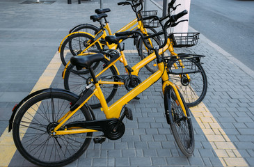 Naklejka premium The yellow bikes for hire