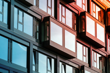 new building facade , windows on apartment house exterior