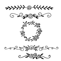 Hand drawn vector dividers. Lines, borders and laurels set. Doodle design elements.