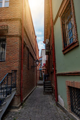 Narrow street in the old city of Tbilisi. Narrow passage between houses