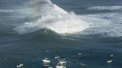 Aerial surfers on extreme surf competition Mavericks America
