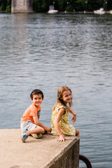Sister and Brother Playing by the Water