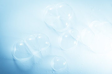 Beautiful abstract close up color blue and white soap bubbles background and wallpaper