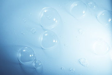 Beautiful abstract close up color blue and white soap bubbles background and wallpaper