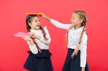 Break is time for fun. Education concept. Cute small children holding books. Adorable little girls...
