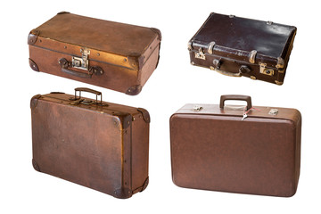 Old shabby vintage suitcases isolated on white background. Retro style