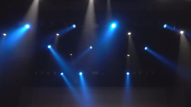 Stage lights shining at studio. Seamless looping animation. The spotlights on the stage. Stage light