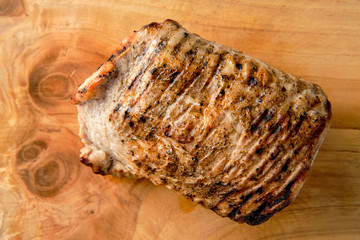 Baked peace of meat on cutting board