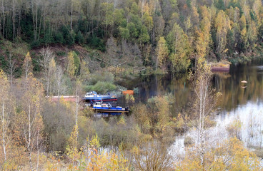 boat on the river in autumn